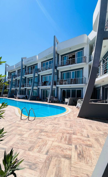 GİRNE/ALSANCAK'TA MERİT ROYAL BÖLGESİ'NDE SATILIK 1+1 DAİRE-1