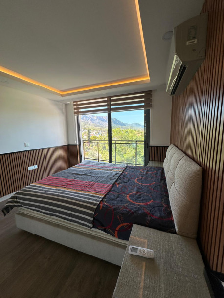 GİRNE AKACAN SİTESİNDE SATILIK DENİZ VE DAĞ MANZARALI 4+1 EŞYALI DAİRE-9