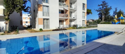 GİRNE /ALSANCAK'TA SATILIK 2+1 HAVUZLU SİTE İÇİNDE BAHÇELİ DAİRE