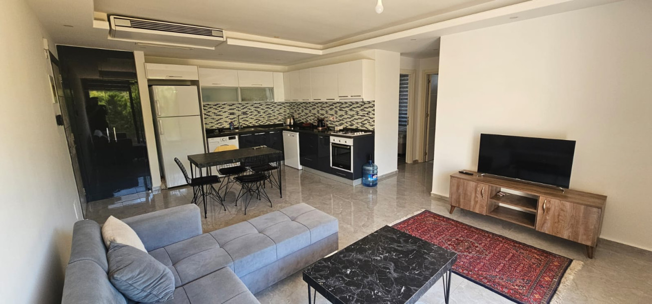 GİRNE/LAPTA'DA HAVUZLU SİTE İÇERİSİNDE SATILIK 2+1 BAHÇELİ DAİRE-5