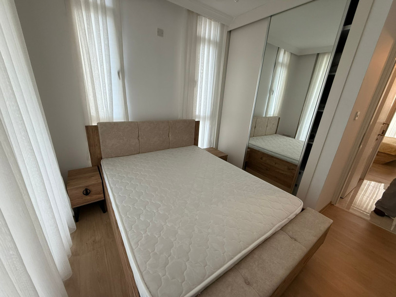GİRNE/ALSANCAK'TA SATILIK SİTE İÇERİSİNDE 2+1 EŞYALI DAİRE-9